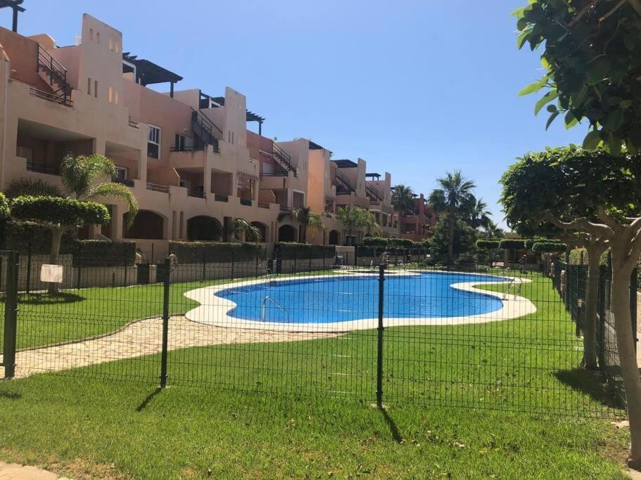 Bajo Con Jardin A Pie De Playa Y Piscina Comunitaria Con Jacuzzi Daire Playas de Vera Dış mekan fotoğraf